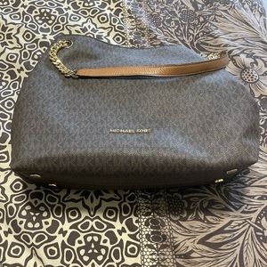 Shoulder bag .Colour is brown brand Micheal Kors
